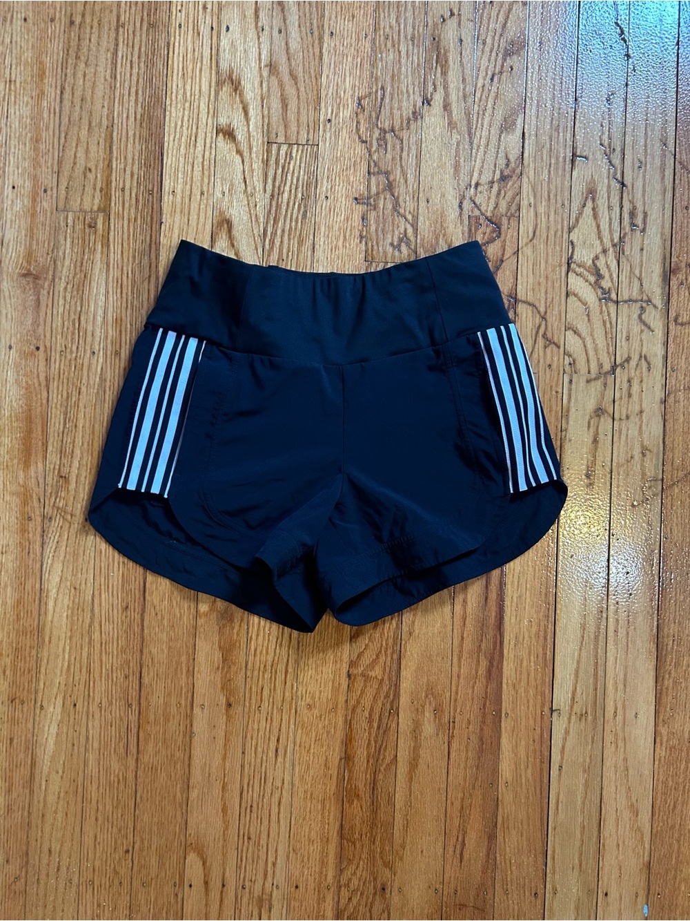 Athleta Black Women's Athletic Shorts with White Stripe Detail